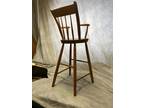 Antique Thumb back high chair for a child
