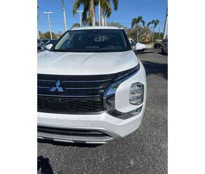 2024 Mitsubishi Outlander SEL is a White 2024 Mitsubishi Outlander SEL SUV in Fort Myers FL