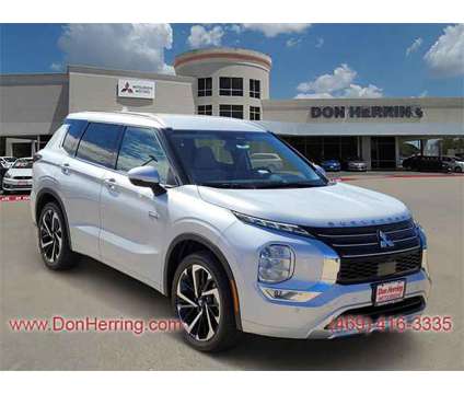 2024 Mitsubishi Outlander PHEV SEL is a White 2024 Mitsubishi Outlander SEL SUV in Plano TX