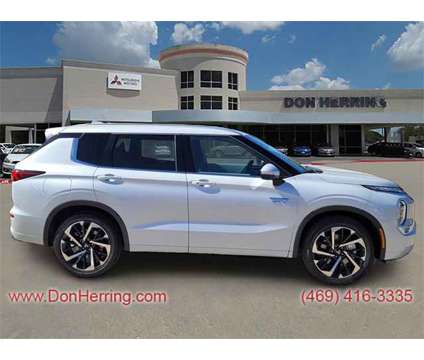 2024 Mitsubishi Outlander PHEV SEL is a White 2024 Mitsubishi Outlander SEL SUV in Plano TX