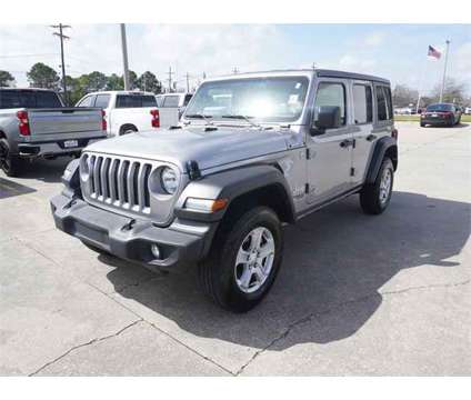 2021 Jeep Wrangler Unlimited Sport S is a Silver 2021 Jeep Wrangler Unlimited SUV in Plaquemine LA