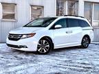 2014 Honda Odyssey Touring with Rear Entertainment System and Navigation