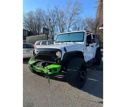 2016 Jeep Wrangler for sale is a White 2016 Jeep Wrangler Car for Sale in Paterson NJ