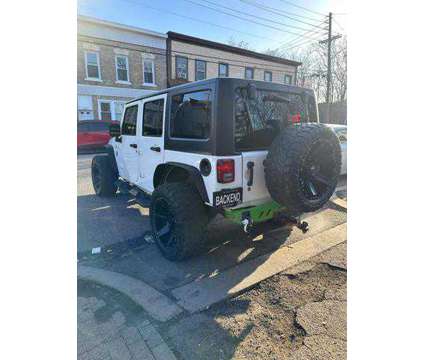2016 Jeep Wrangler for sale is a White 2016 Jeep Wrangler Car for Sale in Paterson NJ