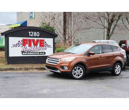 2017 Ford Escape for sale is a Orange 2017 Ford Escape Car for Sale in Roswell GA