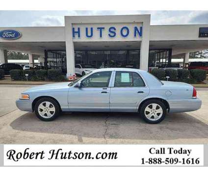 2011 Ford Crown Victoria LX is a Blue 2011 Ford Crown Victoria LX Car for Sale in Moultrie GA