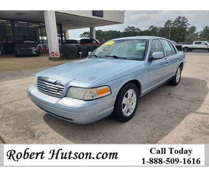 2011 Ford Crown Victoria LX is a Blue 2011 Ford Crown Victoria LX Car for Sale in Moultrie GA