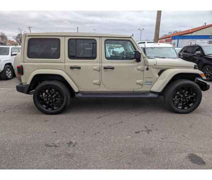 2022 Jeep Wrangler 4xe Unlimited Sahara is a Gold 2022 Jeep Wrangler Unlimited Sahara Car for Sale in Enfield CT