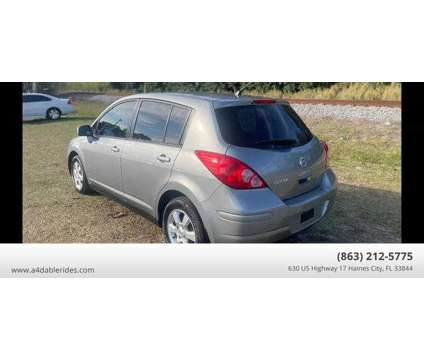 2011 Nissan Versa for sale is a Grey 2011 Nissan Versa 1.6 Trim Car for Sale in Haines City FL