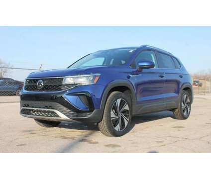 2024 Volkswagen Taos 1.5T SE is a Blue 2024 1.5T SE SUV in Bay City MI