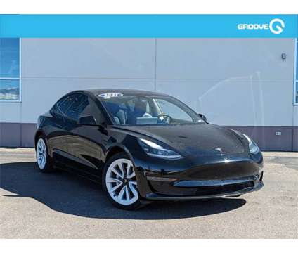 2021 Tesla Model 3 Standard Range Plus is a Black 2021 Tesla Model 3 Sedan in Colorado Springs CO