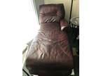 Brown leather chaise lounge chair