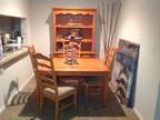 Solid pine dinning table 4 highback chaiirs and a 2 piece buffet