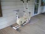 Exercycle, similar to a Schwinn Air Dyne.