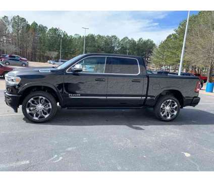 2024 Ram 1500 Limited is a Black 2024 RAM 1500 Model Limited Truck in Wake Forest NC