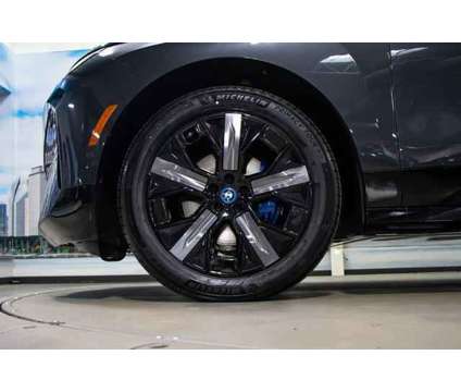 2024 BMW iX xDrive50 is a Grey 2024 BMW 325 Model iX SUV in Lake Bluff IL