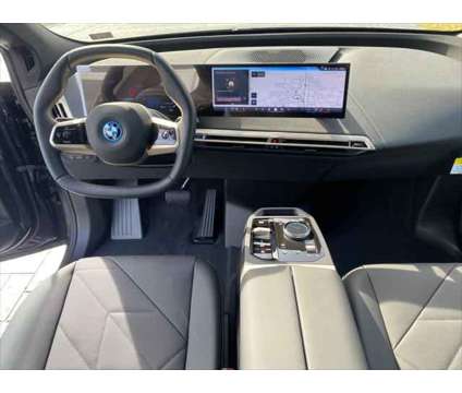 2024 BMW iX xDrive50 is a Black 2024 BMW 325 Model iX SUV in Mechanicsburg PA