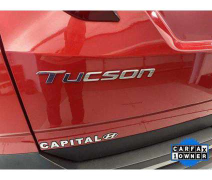 2022 Hyundai Tucson SEL is a Red 2022 Hyundai Tucson SUV in Jacksonville NC