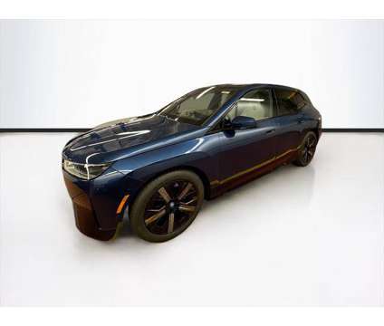 2024 BMW iX xDrive50 is a Blue 2024 BMW 325 Model iX SUV in Peabody MA