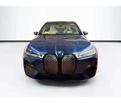 2024 BMW iX xDrive50 is a Blue 2024 BMW 325 Model iX SUV in Peabody MA