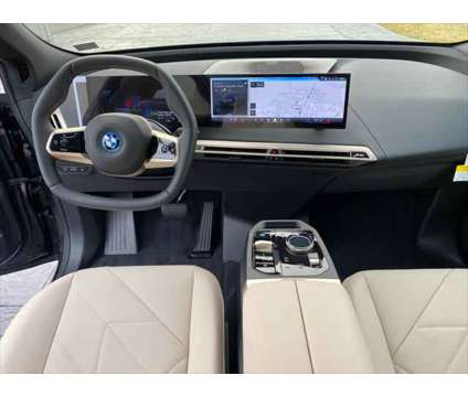 2024 BMW iX xDrive50 is a Grey 2024 BMW 325 Model iX SUV in Mechanicsburg PA