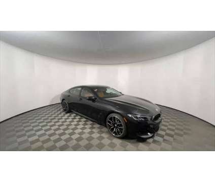 2024 BMW 8 Series i xDrive is a Black 2024 BMW 8-Series Sedan in Freeport NY