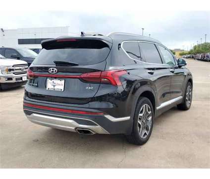 2023 Hyundai Santa Fe Limited is a Black 2023 Hyundai Santa Fe Limited SUV in Lake Jackson TX