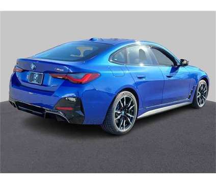 2024 BMW i4 M50 is a Blue 2024 Sedan in Milford DE