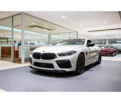 2024 BMW M8 Competition is a Blue 2024 BMW M3 Convertible in Lake Bluff IL