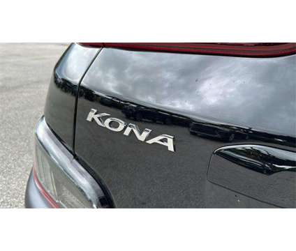 2023 Hyundai Kona Limited is a Black 2023 Hyundai Kona Limited SUV in Vero Beach FL
