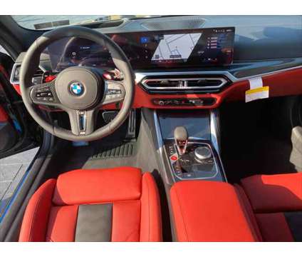 2024 BMW M4 Competition xDrive is a Black 2024 BMW M4 Coupe in Mechanicsburg PA