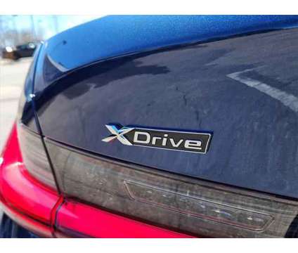 2024 BMW 3 Series 330i xDrive Sedan is a Blue 2024 BMW 3-Series Sedan in Loveland CO