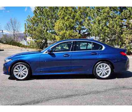 2024 BMW 3 Series 330i xDrive Sedan is a Blue 2024 BMW 3-Series Sedan in Loveland CO