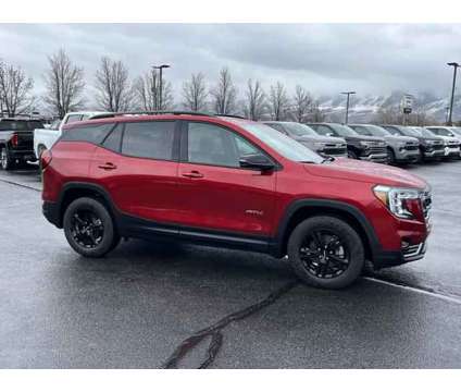 2024 GMC Terrain AWD AT4 is a Red 2024 GMC Terrain SUV in Logan UT