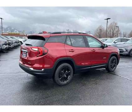 2024 GMC Terrain AWD AT4 is a Red 2024 GMC Terrain SUV in Logan UT