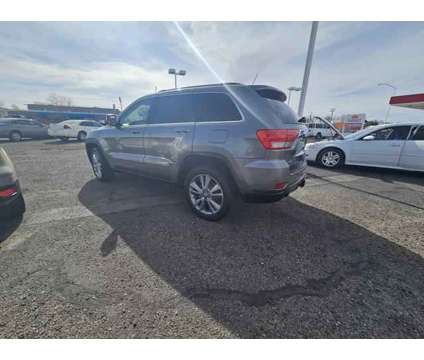 2013 Jeep Grand Cherokee for sale is a Grey 2013 Jeep grand cherokee Car for Sale in Las Cruces NM