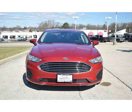 2020 Ford Fusion Hybrid SE is a Red 2020 Ford Fusion Hybrid SE Hybrid in Lombard IL