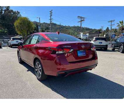 2024 Nissan Versa SV is a Red 2024 Nissan Versa 1.6 Trim Car for Sale in Los Angeles CA