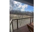 Impeccably maintained River Watch condo