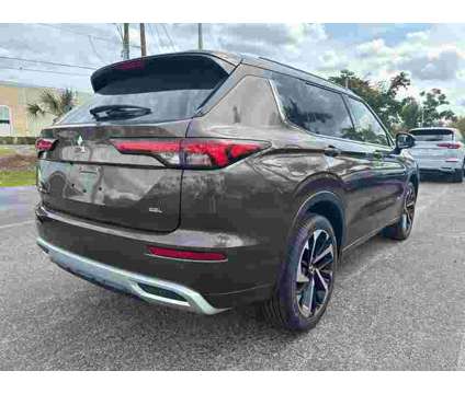 2024 Mitsubishi Outlander SEL is a Tan 2024 Mitsubishi Outlander SEL SUV in Fort Myers FL