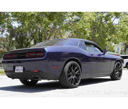 2015 Dodge Challenger SXT is a Blue 2015 Dodge Challenger SXT Coupe in Riverside CA