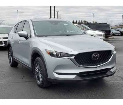 2021 Mazda CX-5 Touring is a Silver 2021 Mazda CX-5 Touring SUV in Brunswick OH