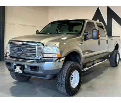 2004 Ford F350 Super Duty Crew Cab for sale is a Gold 2004 Ford F-350 Super Duty Car for Sale in Sacramento CA