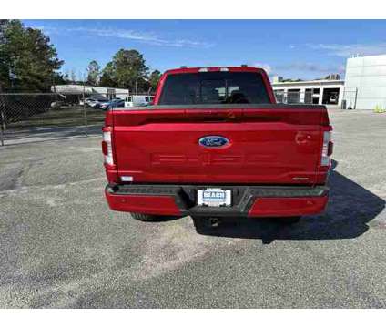 2023 Ford F-150 Lariat is a Red 2023 Ford F-150 Lariat Truck in Little River SC
