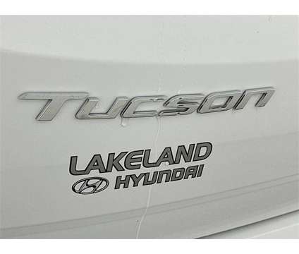 2024 Hyundai Tucson Hybrid N Line is a White 2024 Hyundai Tucson Hybrid in Lakeland FL
