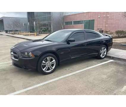 2014 Dodge Charger for sale is a Black 2014 Dodge Charger Car for Sale in Houston TX