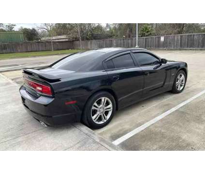 2014 Dodge Charger for sale is a Black 2014 Dodge Charger Car for Sale in Houston TX
