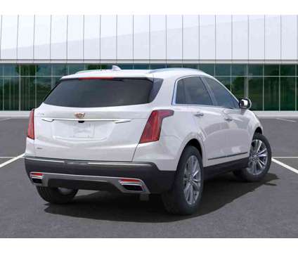 2024NewCadillacNewXT5New4dr is a White 2024 Cadillac XT5 Car for Sale in Moline IL