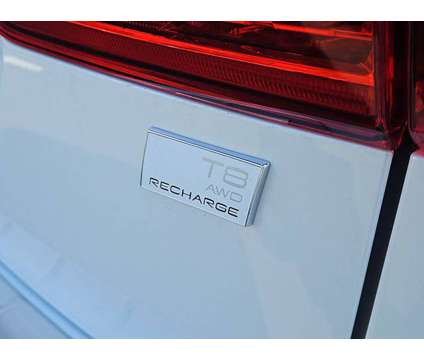2024 Volvo XC60 Recharge Plug-In Hybrid Ultimate Dark Theme is a White 2024 Volvo XC60 3.2 Trim Hybrid in Auburn MA
