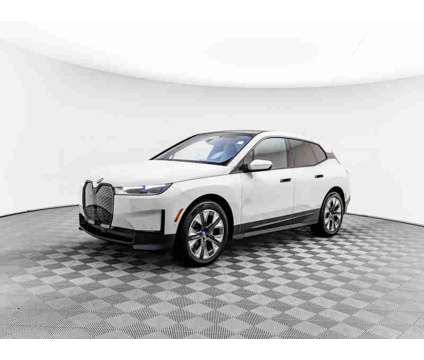 2024 BMW iX xDrive50 is a White 2024 BMW 325 Model iX SUV in Barrington IL